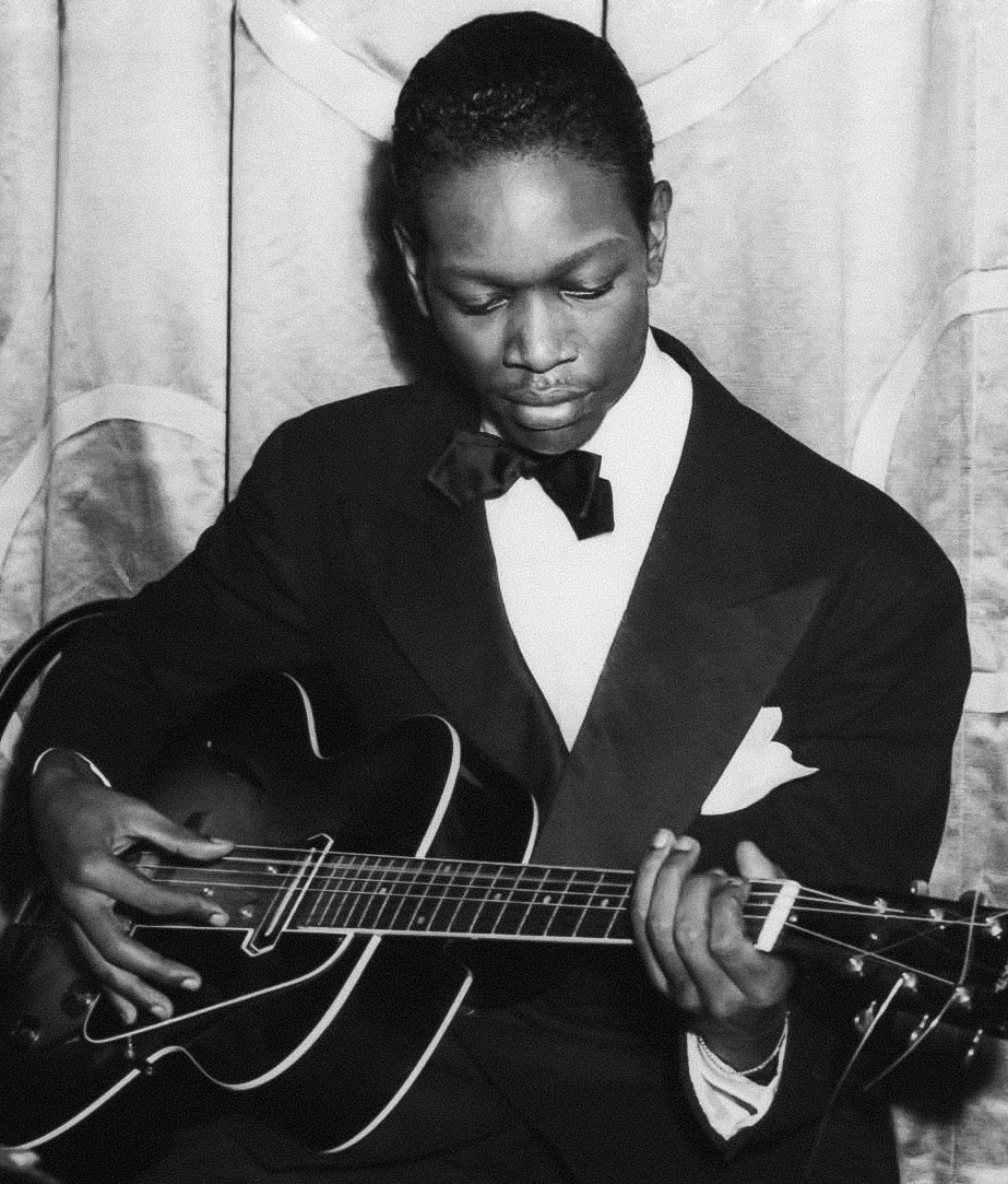 Picture of Charlie Christian playing guitar.